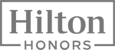 This is the Hilton Honors logo with "Hilton" in bold and "Honors" below it, framed by a rectangular border.